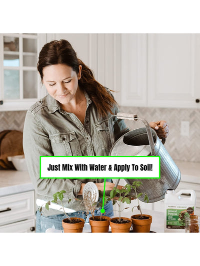Woman Watering Plants with AgroThrive Organic 3-3-2 General Purpose Liquid Fertilizer