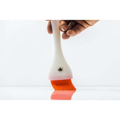 Person Using Cannabrush Flower Trimming Brush for Cannabis Growers