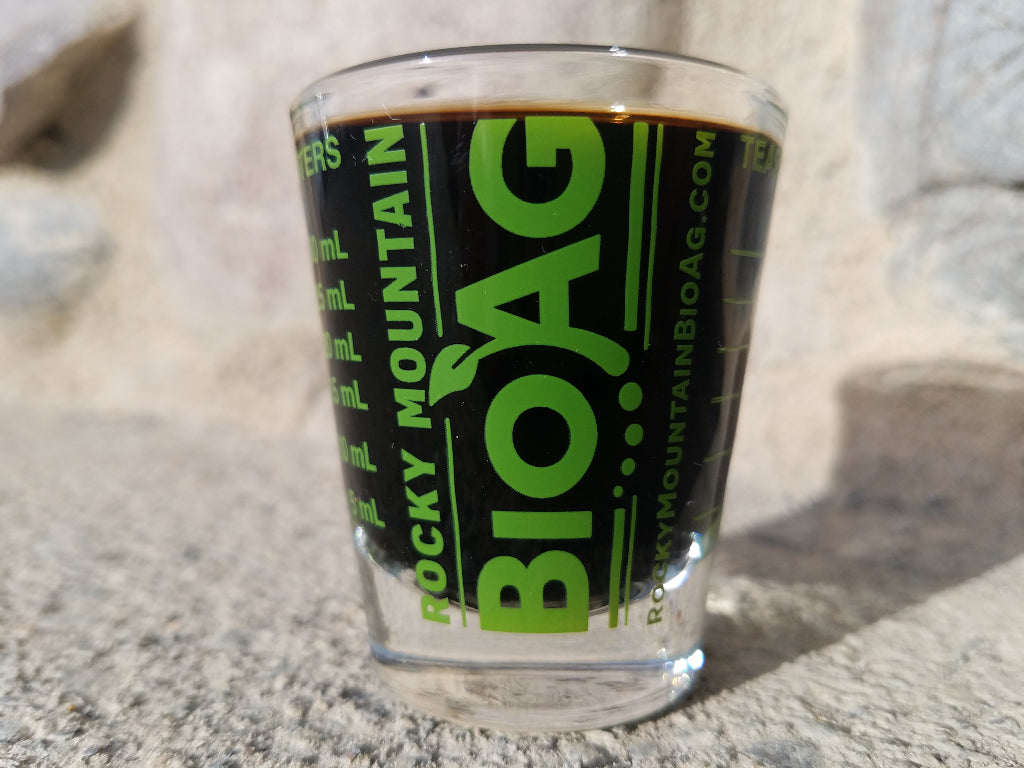 Rocky Mounain BioAg Measuring Shot Glass with Liquid